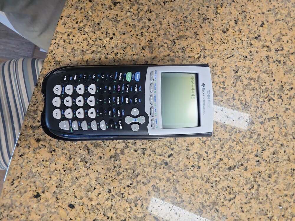 Texas Instruments TI-84 Plus Graphing Calculator with Slide Cover